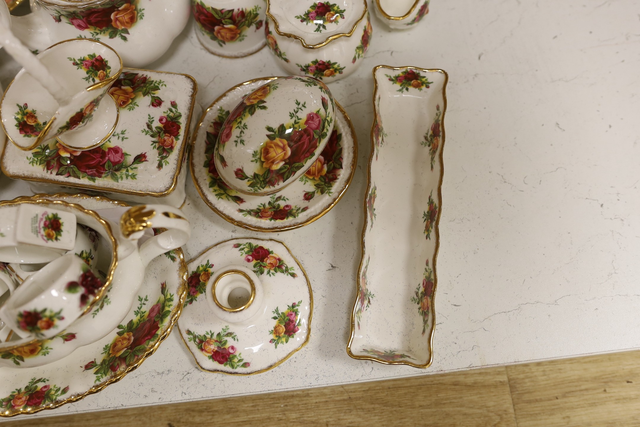 A collection of Royal Albert Old Country Roses tea and dinner service including a collection of vases, pots etc